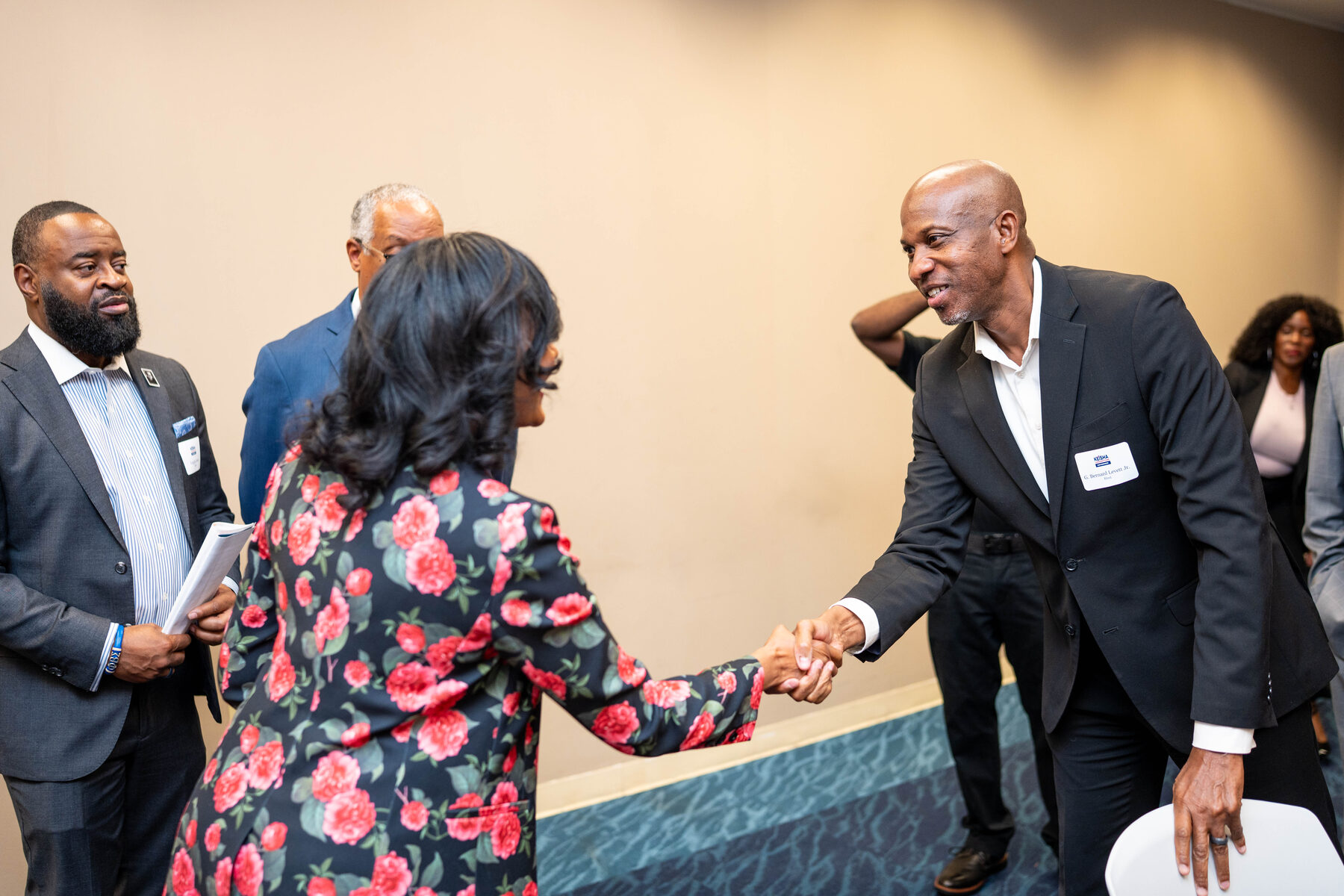 G. Bernard Levett Jr. greets Mayor Keisha Lance Bottoms