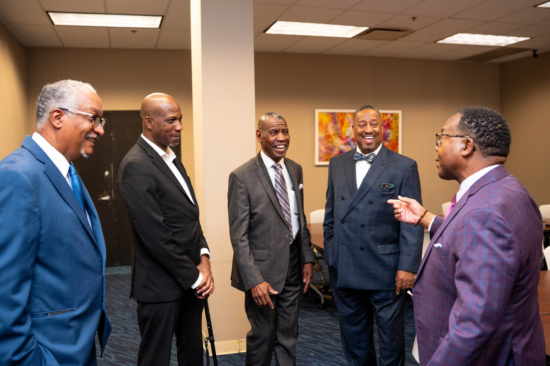 Members of the host committee in conversation